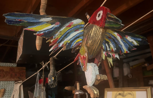 Rainbow Bird Taking Flight by Joshua Ludke