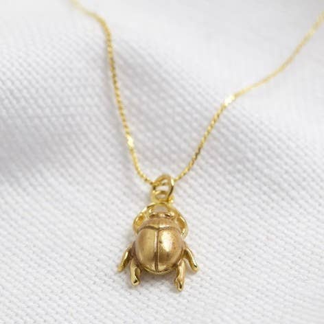 Worn Gold Bug Necklace